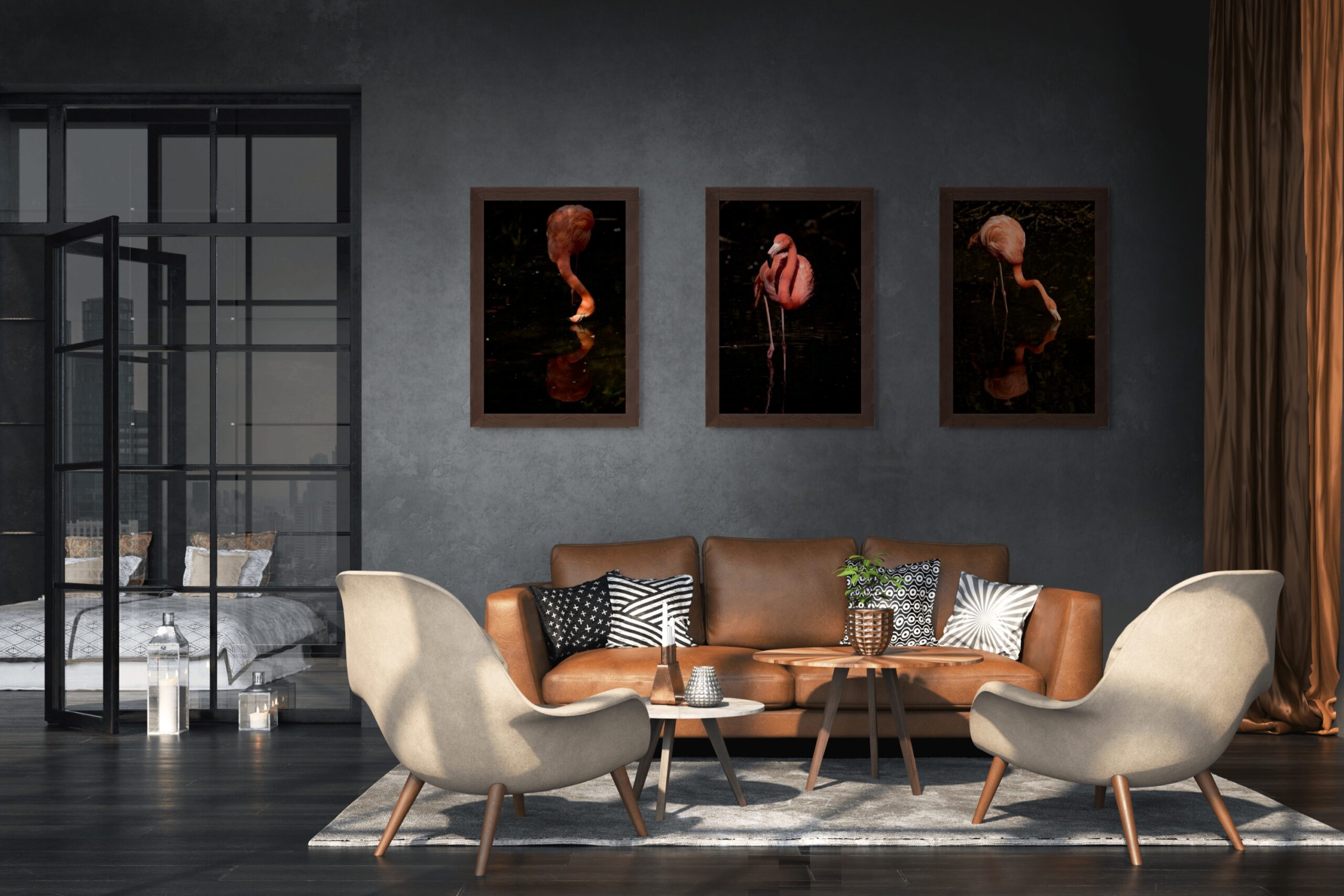 Mockup di un ampio salone moderno in stile industrial con pareti grigio scuro e un trittico fotografico di Antonio Milesi. Le tre opere ritraggono fenicotteri rosa in pose riflessive su sfondo scuro, installate sopra un divano in pelle marrone. Industrial-style luxury living room mockup with dark gray walls and a photographic triptych by Antonio Milesi. The three pieces feature pink flamingos in reflective poses against a dark background, installed above a brown leather sofa.